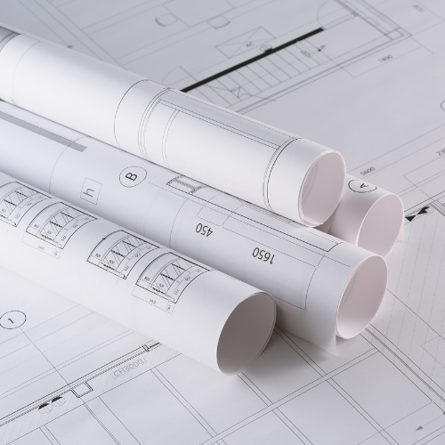 Rolled up blueprints.